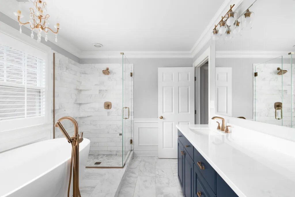 bathroom renovation with luxurious golden finishes