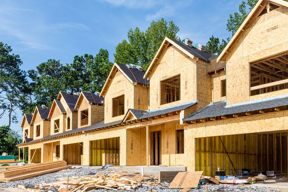 Row of newly constructed homes being built